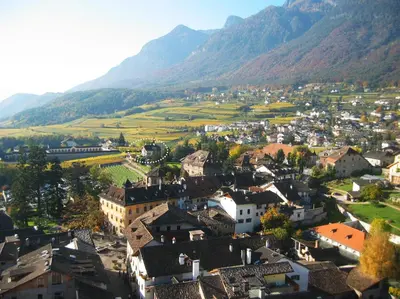 a view of a town in the mountains at Gästehaus Anna in Caldaro