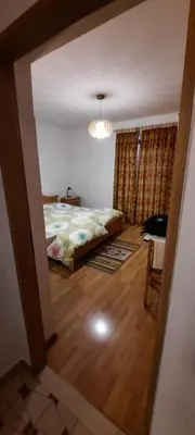 a view of a bedroom with a bed in a room at Hof am Brunnen in Cornaiano