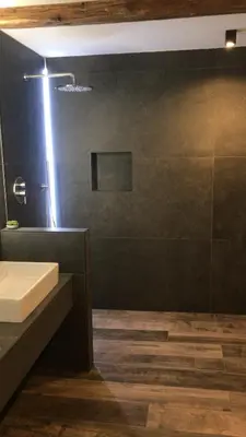 a bathroom with a sink and a mirror at Antonya Apartments in Schenna