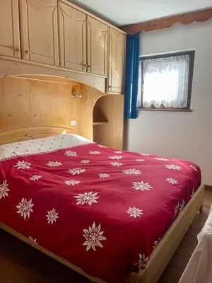 a kitchen with a table with eggs on it at Chalet Valeruz in Canazei