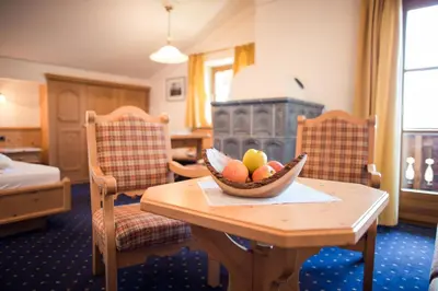 a bowl of fruit on a table in a hotel room at Parc Hotel Tyrol in Castelrotto