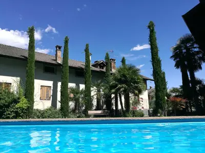 a house with trees and a swimming pool at Residence Reinhild in Nalles
