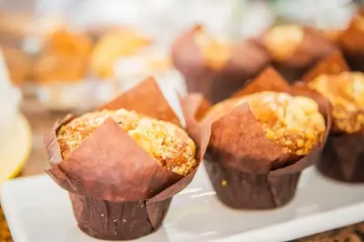 a group of chocolate muffins on a white plate at Hotel Villa Imperina in Agordo