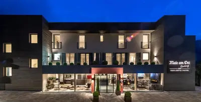a rendering of the front of a building at Mair Am Ort Living Hotel B&B in Parcines