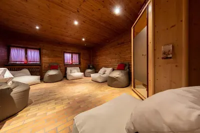 a room with four bean bags in a room at hubertus dolomites in Fiè
