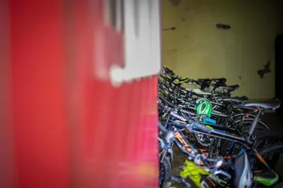 a group of bikes parked in a room at Gartenheim Tramin in Termeno