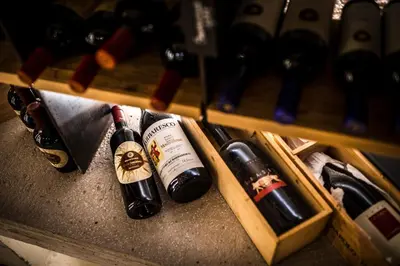 a bunch of bottles of wine in a rack at Gourmet Hotel Gran Ander in Badia