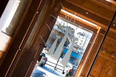 an open door with a view of a street at Sporthotel Spoegler in Collalbo