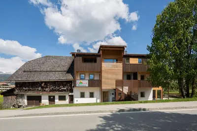 a building on the side of a road at Garni Bachlerhof in Brunico