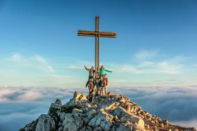 a cross on top of a mountain at Hotel Marica in Eggen