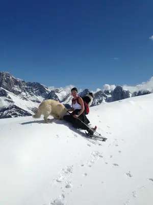 a man and a polar bear in the snow at B&B La Montanara in San Martino di Castrozza