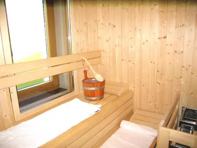 a inside of a sauna with a bucket at Agriturismo Ferienhof Gschloier - Adults Only in Laion