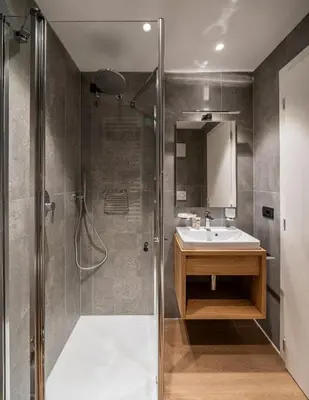 a bathroom with a shower and a sink at Residence Contrin in Canazei