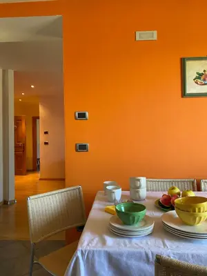 a table with two bowls of fruit on it at Agriturismo La Canonica in Brez