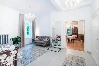 a living room with a couch and a table at Residence Diana in Merano