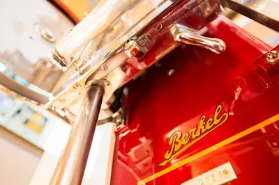 a close up of the back of a red machine at Chalet Marcora in Campitello di Fassa