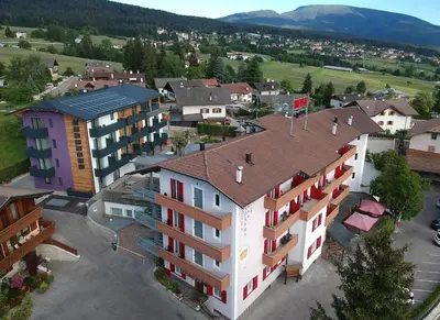 an overhead view of a town with buildings at Hotel Panorama Wellness & Resort in Malosco