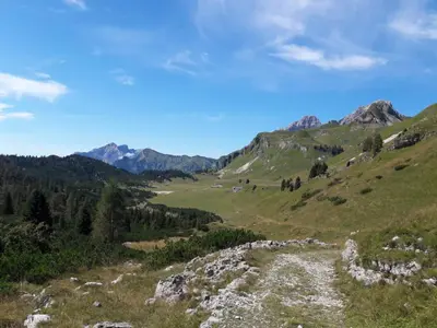 a view of a valley with mountains in the background at B&B DOLOMIA in Sagron Mis