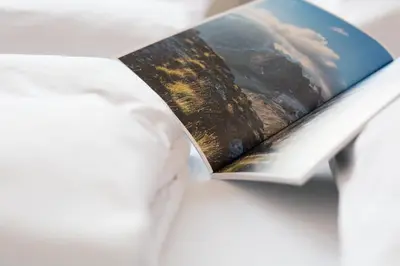 a book sitting on top of a table at LINGHOF in Tirolo