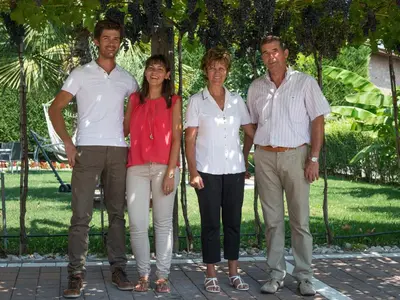 a group of people posing for a picture at Rebenheim in Termeno