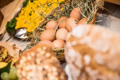 a buffet line with many different types of food at Vitaurina Royal Hotel in Molini di Tures
