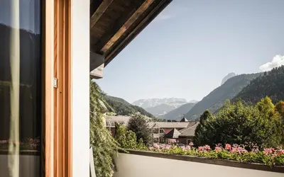 a view from a window of a mountain valley at B&B Villa Angelino in Ortisei