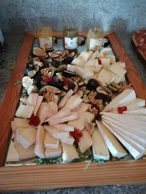 a plate of food on a white plate at Hotel Alaska in Selva di Val Gardena