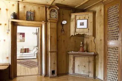 a living room with a door and a couch at Agriturismo Sittnerhof in Merano