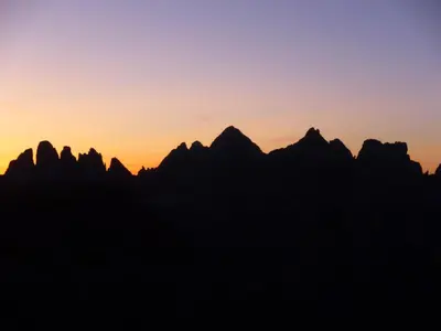 a silhouette of the mountains at sunset at Villa Martha Vintage Hotel-B&B in Santa Cristina in Val Gardena