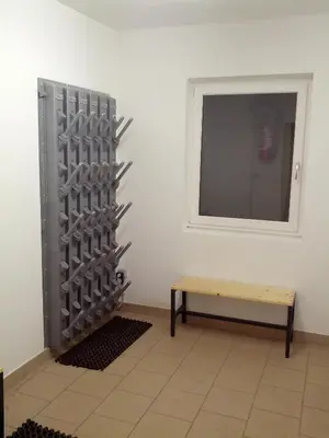 a room with a bunch of knives hanging on the wall at Villa Otto in Santa Cristina in Val Gardena