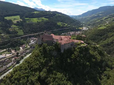 an aerial view of a house on a mountain at Parkhotel Post in Chiusa