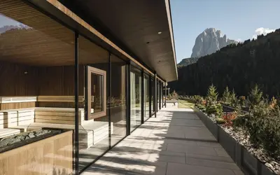 a building with a view of a mountain at Residence Sovara in Santa Cristina in Val Gardena