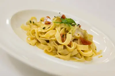 a plate of pasta on a white plate at Hotel Seeber in Racines