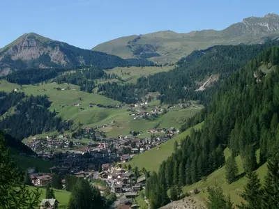 a small town in a valley in the mountains at B&B Appartments Cudlea in Selva di Val Gardena