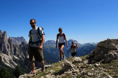 a group of people standing on top of a mountain at Hotel Gran Paradis in Campitello di Fassa