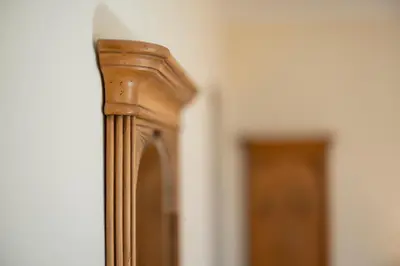 a close up of a wooden door in a room at Weingarten Terlan - Rooms & Breakfast in Terlano
