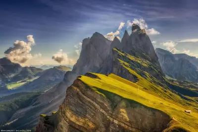 a view of a mountain with yellow grass on it at Apartment Villa Stefania in Selva di Val Gardena
