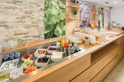 a buffet line with many different types of food at Hotel Erika in Braies