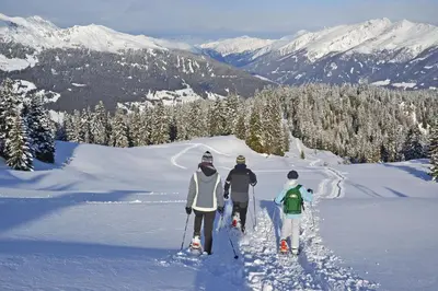 a group of three people on skis in the snow at Residence Talblick in San Leonardo in Passiria