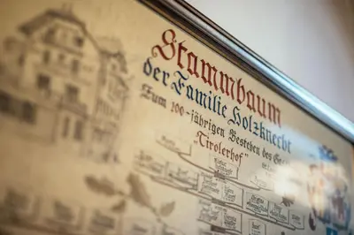 a sign with a picture of a building at Tirolerhof in San Leonardo in Passiria