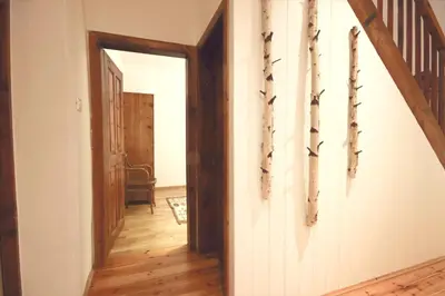 a hallway with a door leading into a room at Finhäusl in Aldino