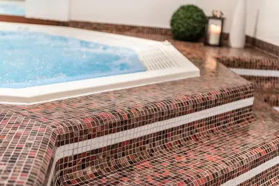 a swimming pool on a table in a room at B&B Hotel Alpenrose Rooms & Apartments in Valles