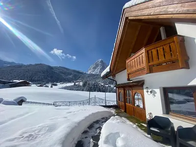 a house in the snow with a view of a mountain at Chalet Romy - AP Sasplat in Pramauron