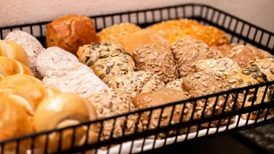 a basket filled with lots of different types of donuts at Hotel Villa Laurus in Merano