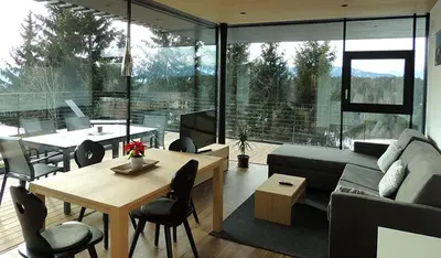 a living room with a couch and a table at Residence Moritz in Avelengo