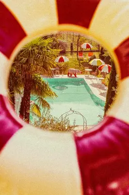 a view of a swimming pool in a resort at Amadeus Ora & Amore in Caldaro