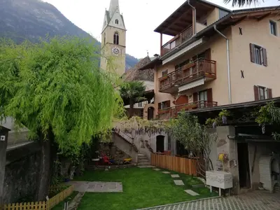 a courtyard of a building with a clock tower at Haus Möltner - Apartment 