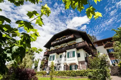 akritkritkrit inn is a boutique hotel with a view of the building at Hotel Latemar in Soprabolzano