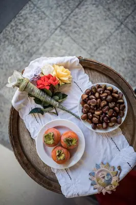 a table with two plates of food and nuts at Weingut Donà in Appiano sulla Strada del Vino