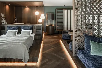a bedroom with a large bed and a couch at SILENA, your soulful hotel - adults only in Valles
